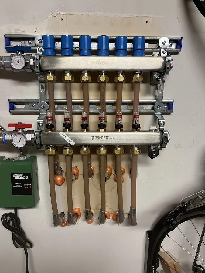 Plumber performing Gas Line Installation at a residential property in Seminole